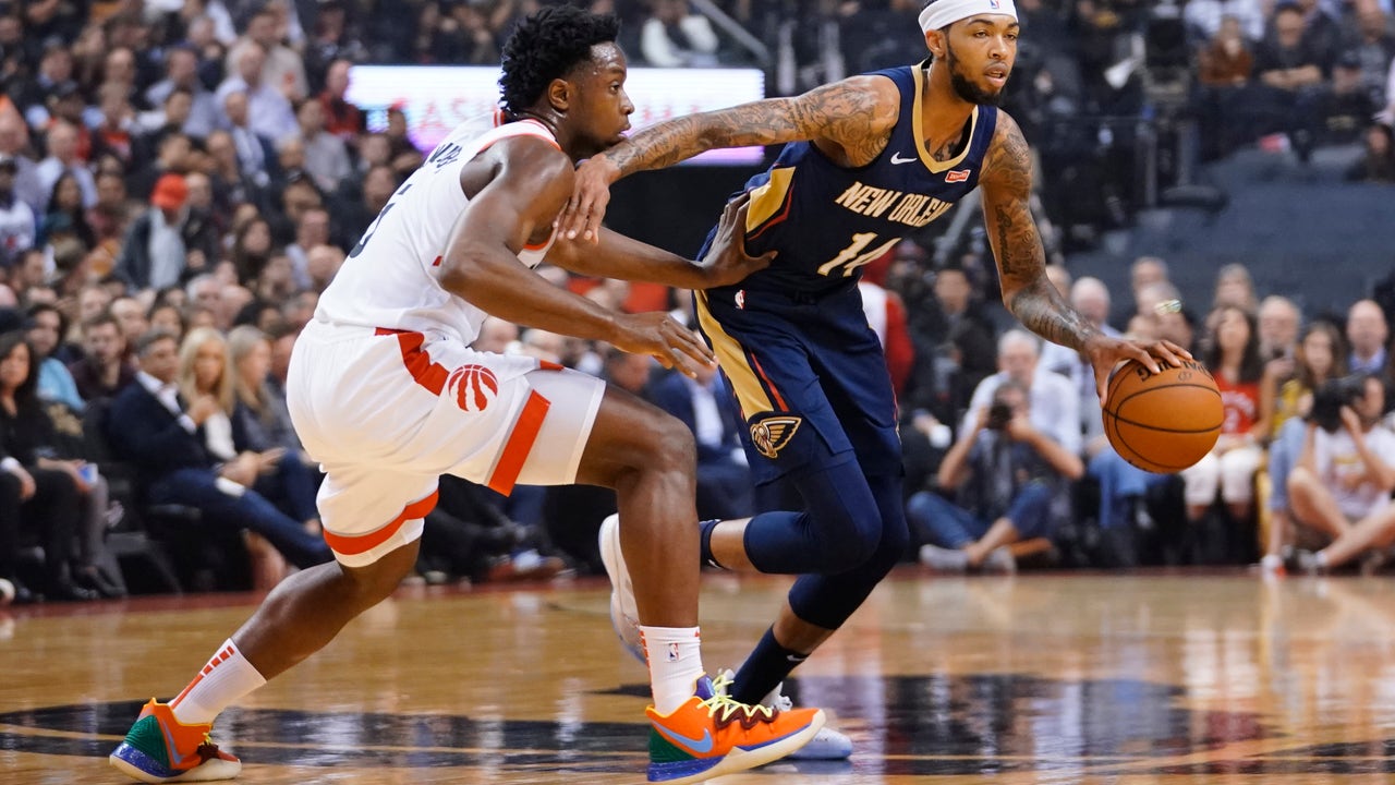 Pelicans take defending champion Raptors to overtime on Opening Night